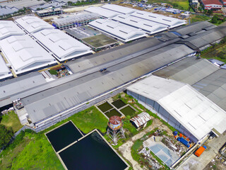 Abstract Defocused Blurred Background aerial collection of textile factories specially built for...