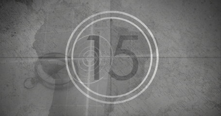 Image of number 15 in white circle over grey world map with circular scanner and compass