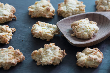 Homemade oatmeal cookies on dark background.