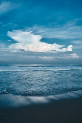 beautiful beach and cloudy blue sky