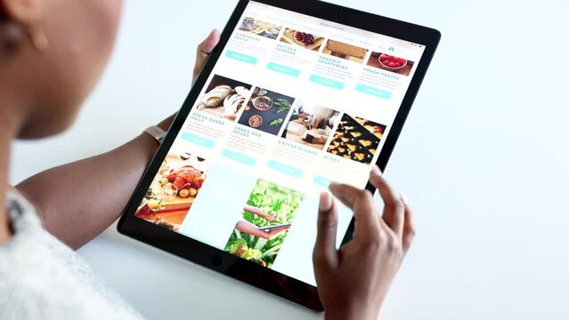 Social media, food and blog by woman influencer on digital tablet, checking homepage design and layout. Health, diet and female nutritionist posting health tips vegan trends, searching online content