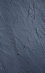 Cracked gray stucco wall. 　ヒビの入ったグレーの漆喰の壁