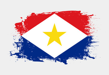 Fototapeta premium Brush painted national emblem of Saba country on white background