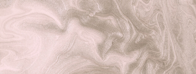 Abstract fluid art background light brown colors. Liquid marble. Acrylic painting on canvas with beige shiny gradient.