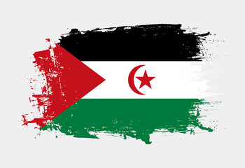 Brush painted national emblem of Western Sahara country on white background