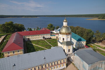Fototapeta na wymiar The monastery of the Nilo-Stolobenskaya deserts in the Tver region. The Church of Peter and Paul and the monastery hotel