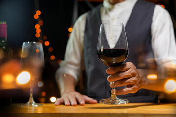 Bartender Serve wine, on wood bar, 