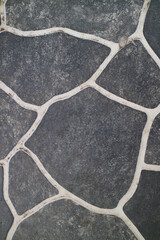 black and white outdoor ceramic with river stone texture