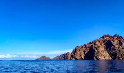 The Scandola Nature Reserve.  South-west of Calvi, on the Cape Girolata peninsula. Beautiful coast of Corsica in September.
