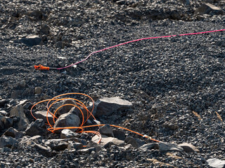 Explosive works, drilled rocks stuffed with explosives and colorful ignition lines