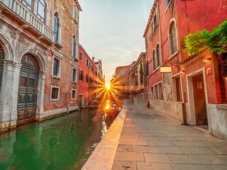 Fototapeta na wymiar Venezia sunset water Lagoon embedded with old mediterranean Architecture 