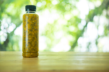 Fresh passion fruit in plastic bottle, packed in a ready-to-drink.