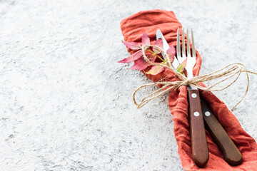 Thanksgiving autumn place setting with cutlery