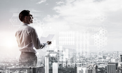 Concept of business success and control with confident boss against cityscape background