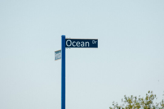 Ocean Drive Sign On Blue Sky