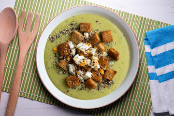 Artichoke cream with bread croutons and boiled egg. Typical Spanish vegan tapas.