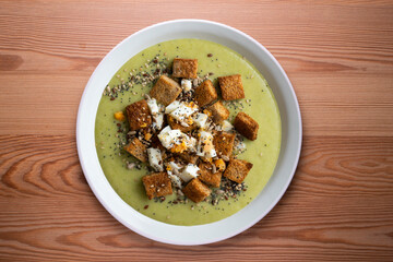 Artichoke cream with bread croutons and boiled egg. Typical Spanish vegan tapas.
