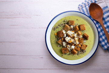 Artichoke cream with bread croutons and boiled egg. Typical Spanish vegan tapas.