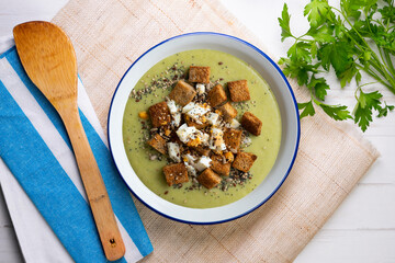 Artichoke cream with bread croutons and boiled egg. Typical Spanish vegan tapas.