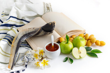Tallit, shofar (horn), apple, honey, pomegranate, dates and Torah. Rosh Hashanah (jewish holiday)...
