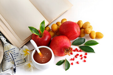 Tallit, shofar (horn), apple,  pomegranate, dates and Torah. Rosh Hashanah (jewish holiday)...