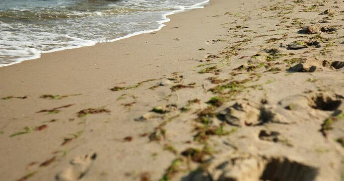 Leg, feet ittle girl run on the beach, sea family vacation, Resort fun by the sea