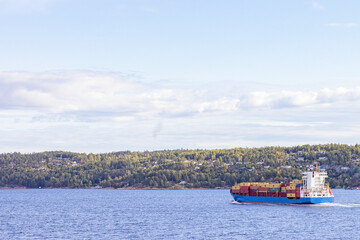 The container ship Mistral of Madeira through the Drøbakksundet on its way to Oslo,Norway,Europe