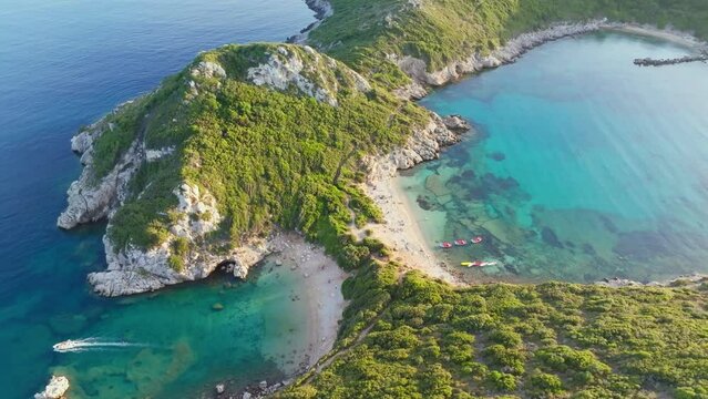 Aerial shot of Porto Timoni beach on Corfu Island, Greece. Beach and lagoon with turquoise water, nature of mediterranean Greek islands