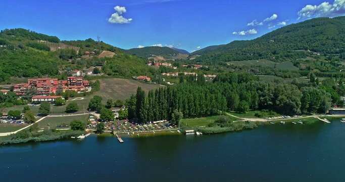 Aerial view of the lake of Piediluco and the Circolo Canottieri Piediluco, a sports and social structure, which mainly deals with rowing. Terni, Umbria, Italy, Europe