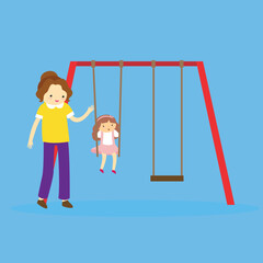 mom rides daughter on a swing