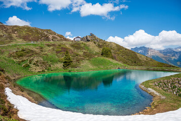 Fototapeta na wymiar Landscape with the pond at Kleine Scheidegg station above Grindelwald. Switzerland.