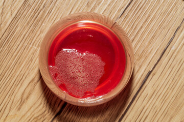 Above shot of a red drink on the table