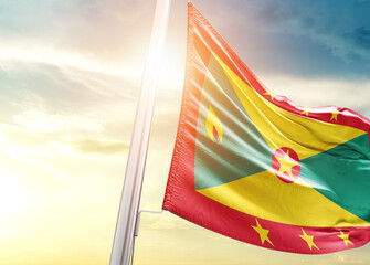 Grenada national flag cloth fabric waving on the sky - Image - obrazy, fototapety, plakaty