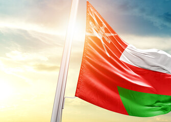 Oman national flag cloth fabric waving on the sky - Image