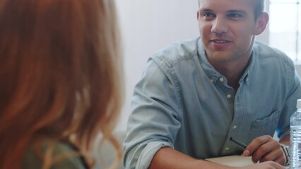 Interview, contract and hiring with hr in an office, happy and relax welcome for new employee, Startup, recruitment and onboarding with excited candidate reading document and discussion company goal