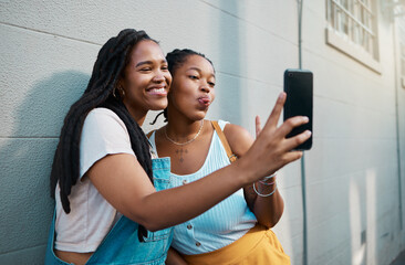 Black women, friends and phone selfie in city, street or outdoor. Relax, bonding and African girls...