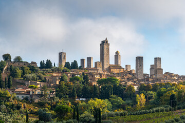 Fototapeta na wymiar Beautiful view of the medieval town of San Gimignano in the Tuscany hills near Siena in Italy, Europe.