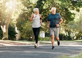 Road running, fitness and senior couple training together on a exercise and workout run. Sports and health motivation of elderly man and woman runner in retirement living a healthy lifestyle