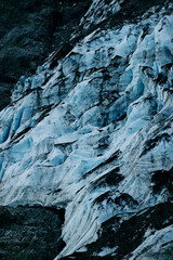 Fototapeta na wymiar glacier in alaska taken with telephotolens for detail blue global warming in alaska