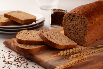 Fototapeta na wymiar Whole wheat rye bread with flax seeds