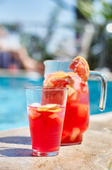 fruit cocktails by the pool