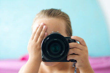 portrait of a girl with a camera