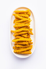 Bhajni chakli sticks or crunchy murukku snack made using diwali festival, favourite munching food