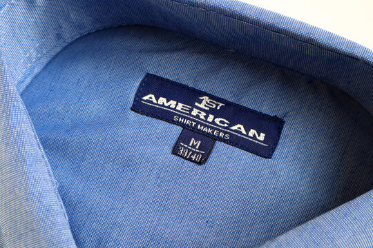 Label of a 1st AMERICAN shirt. 1st American is a fashion brand of clothing