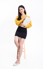 A business woman with a black skirt and a laptop on a white background