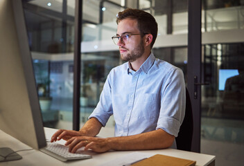 Night worker, businessman and computer planning, working and typing online project proposal, email...