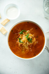 Traditional sauerkraut soup with fresh parsley