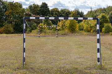 football goal in the field in the village