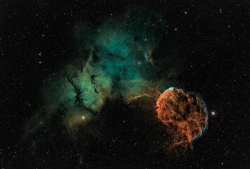 Beautiful dark green jellyfish nebula in a starry galaxy sky