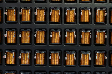 Close up on industrial coils made of copper.